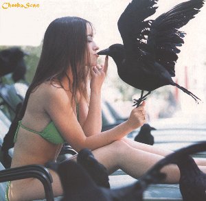 [Jennifer kissing a bird]